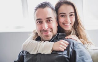 Dad Teenage Daughter Smiling